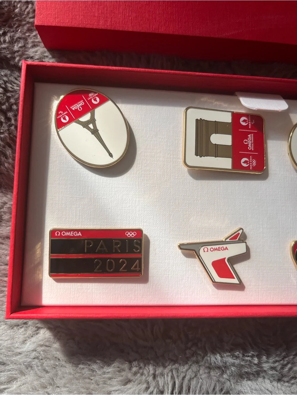 Omega Paris 2024 Red and Gold Enamel Pin Set
